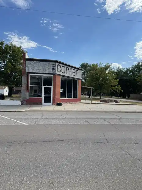 Storefront of The Corner from across W Broadway